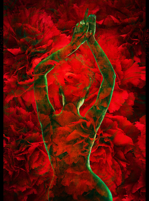 A green woman dances in front of red plants
